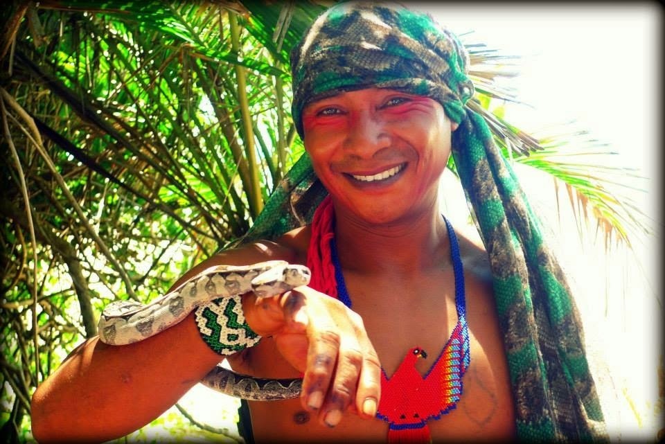 Huni Kuin man smiling with the sacred boa