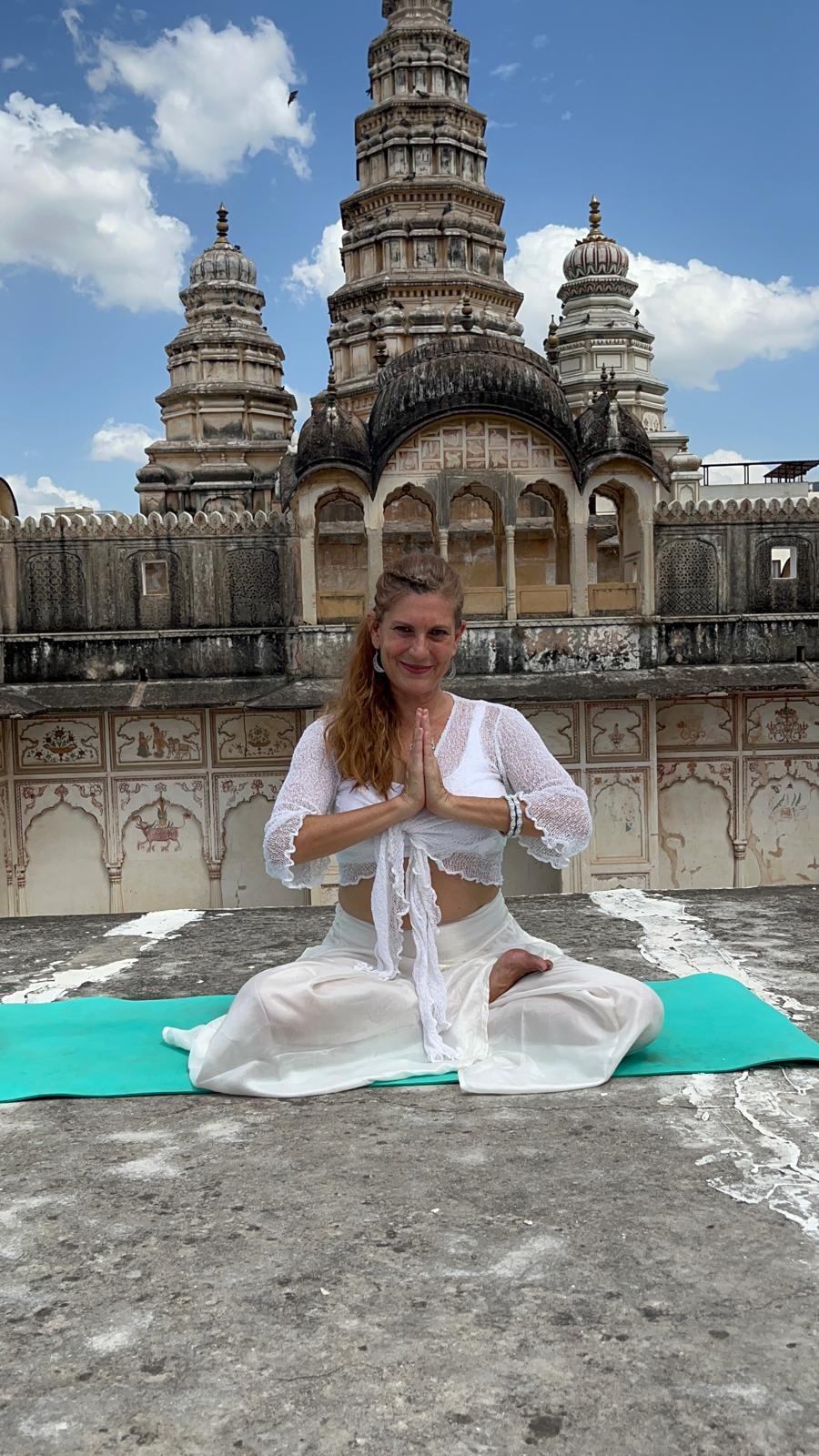 Mojca in meditation at a temple in India