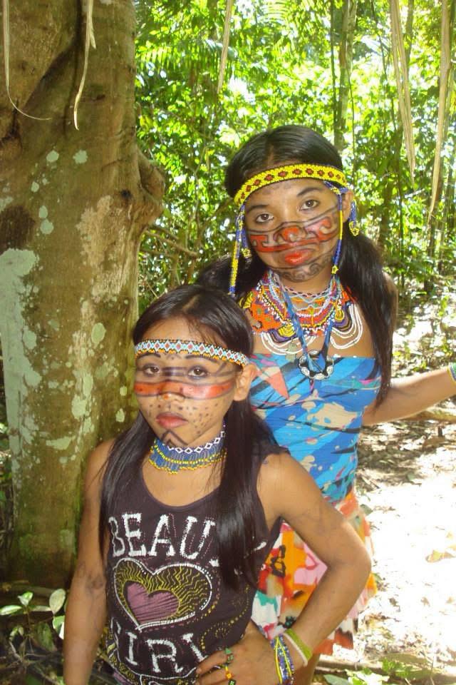 Huni Kuin girls with traditional kene face paint